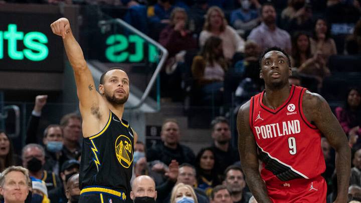 December 8, 2021; San Francisco, California, USA; Golden State Warriors guard Stephen Curry (30) shoots the basketball against Portland Trail Blazers forward Nassir Little (9) during the first quarter at Chase Center. Mandatory Credit: Kyle Terada-USA TODAY Sports